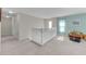 Spacious carpeted loft features natural light from the window at 9102 Kentucky Day Ct, Gibsonton, FL 33534