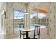 View of the pool and backyard from this bright, charming breakfast nook at 10228 Estuary Dr, Tampa, FL 33647