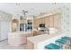 Spacious kitchen with modern appliances, large island, and breakfast bar seating at 10228 Estuary Dr, Tampa, FL 33647