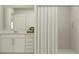 Well-lit bathroom with a vanity, tiled shower, and modern fixtures at 11959 Brae Way, Dade City, FL 33525