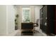Bright home office with modern desk, chair, sleek black cabinet, and light-filtering window at 11959 Brae Way, Dade City, FL 33525