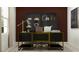 Modern home office with a sleek desk, stylish shelving, and natural light at 11959 Brae Way, Dade City, FL 33525