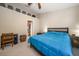 Bedroom featuring carpet, a bed, end tables and access to bathroom at 12346 Country White Cir, Tampa, FL 33635