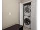 Laundry closet with stacked Samsung washer and dryer at 12346 Country White Cir, Tampa, FL 33635