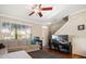 Inviting living room with hardwood floors, a ceiling fan, and a comfortable couch at 12346 Country White Cir, Tampa, FL 33635