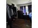 Comfortable bedroom with wood floors, a double bed, and closet space at 1448 Lemon St, Clearwater, FL 33756