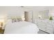 Bright bedroom with closet, and dresser at 18187 Paradise Point Dr, Tampa, FL 33647