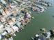 Aerial view featuring a charming waterfront community with easy access to the serene waters, property location un-circled at 187 175Th Terrace E Dr, Redington Shores, FL 33708
