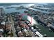 An aerial view of charming waterfront homes, each featuring private boat docks and picturesque canal access at 187 175Th Terrace E Dr, Redington Shores, FL 33708