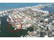 Aerial view circled in red, highlighting a waterfront home with private dock and canal access, near the open ocean waters at 187 175Th Terrace E Dr, Redington Shores, FL 33708