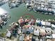 Beautiful waterfront house circled in red, complete with boat dock, set in a desirable neighborhood with canal access at 187 175Th Terrace E Dr, Redington Shores, FL 33708