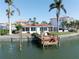 This home boasts a private dock and spacious yard, perfect for outdoor entertaining and waterfront living at 187 175Th Terrace E Dr, Redington Shores, FL 33708