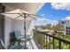 This balcony features a table and comfortable sitting area with a beautiful view at 201 W Laurel St # 702, Tampa, FL 33602