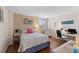 Cozy bedroom with a comfortable bed, bright natural light, and a functional workspace at 201 W Laurel St # 702, Tampa, FL 33602