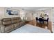 Comfortable living room featuring a plush sofa, elegant decor, and hardwood floors at 201 W Laurel St # 702, Tampa, FL 33602