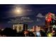Night view of Tampa skyline and buildings from an apartment, with full moon in the sky at 201 W Laurel St # 702, Tampa, FL 33602