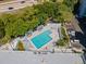 This property includes an outdoor pool area with chairs and landscaping at 201 W Laurel St # 702, Tampa, FL 33602