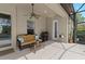 Relaxing screened-in patio featuring ceiling fan, outdoor furniture, and a grill, perfect for entertaining at 21654 Draycott Way, Land O Lakes, FL 34637