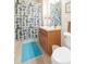 Bathroom featuring a shower with a nautical curtain and single sink vanity at 2211 Kings Palace Dr, Riverview, FL 33578