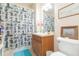 Bathroom featuring a shower with a nautical curtain and single sink vanity at 2211 Kings Palace Dr, Riverview, FL 33578