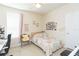 Cozy bedroom with light colored walls, carpet flooring, and a ceiling fan at 2211 Kings Palace Dr, Riverview, FL 33578