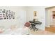 This bedroom features carpet, a keyboard, and a white door at 2211 Kings Palace Dr, Riverview, FL 33578