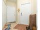 Neutral entryway featuring a large front door and interior closet at 2211 Kings Palace Dr, Riverview, FL 33578
