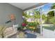 Cozy screened patio filled with plants, providing a serene outdoor living space at 2211 Kings Palace Dr, Riverview, FL 33578