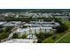 Aerial view of the condo complex, golf course, and surrounding community at 225 Country Club Dr # 1104, Largo, FL 33771