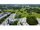 Wide aerial shot of buildings on the golf course with a scenic view at 225 Country Club Dr # 1104, Largo, FL 33771