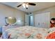 This bedroom offers a mirror and comfortable decor at 225 Country Club Dr # 1104, Largo, FL 33771