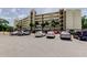 Exterior of condo building with covered parking at 225 Country Club Dr # 1104, Largo, FL 33771