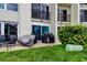 A private outdoor patio with a grill and comfortable seating for relaxation and enjoyment at 225 Country Club Dr # 1104, Largo, FL 33771