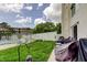 A private outdoor patio with a grill and seating area offers a tranquil retreat at 225 Country Club Dr # 1104, Largo, FL 33771