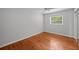 Spacious bedroom with ceiling fan and hardwood floors at 3409 W El Prado Blvd, Tampa, FL 33629