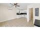 Efficiently designed kitchen with stainless steel appliances and adjacent bathroom at 3409 W El Prado Blvd, Tampa, FL 33629