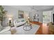 Bright living room with hardwood floors, stylish furniture, and contemporary decor elements for a modern feel at 3409 W El Prado Blvd, Tampa, FL 33629