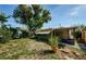 Expansive backyard showcasing a lush lawn and established landscaping for outdoor enjoyment at 3815 Bowen St, New Port Richey, FL 34652