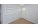 Bright foyer showcases clean white walls, neutral tiled flooring, and a classic paneled door, creating an inviting entry at 3815 Bowen St, New Port Richey, FL 34652