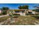 Charming single-story home with a well-maintained front yard and covered entry, blending comfort and curb appeal at 3815 Bowen St, New Port Richey, FL 34652