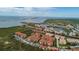 Aerial view of a waterfront community with beautiful buildings and a bridge at 4323 Bayside Village Dr # 229, Tampa, FL 33615