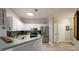 Bright kitchen with stainless steel appliances, stylish backsplash, and ample counter space at 4323 Bayside Village Dr # 229, Tampa, FL 33615