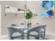 Dining area showcasing modern decor, sleek chairs, and ample natural light at 4522 W North B St, Tampa, FL 33609