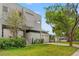 Modern two-story home with a manicured lawn and attached two-car garage at 4522 W North B St, Tampa, FL 33609