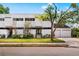 Modern two-story home with a manicured lawn and two-car garage at 4522 W North B St, Tampa, FL 33609