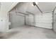 Spacious and well-lit garage with ample storage and two garage doors at 4522 W North B St, Tampa, FL 33609