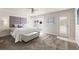 Serene main bedroom showcasing a plush bed, a glass-door closet, and a calming ambiance at 4522 W North B St, Tampa, FL 33609