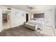 The main bedroom boasts a cozy bed, a walk-in closet, and a calming color palette to enhance relaxation at 4522 W North B St, Tampa, FL 33609