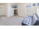Upstairs loft area featuring a television, providing a perfect spot for relaxing and watching movies at 5571 Birch River Trl, Wesley Chapel, FL 33545