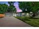 Charming single story home with a well-manicured lawn and mature trees at 5907 Tampa Shores Blvd, Tampa, FL 33615